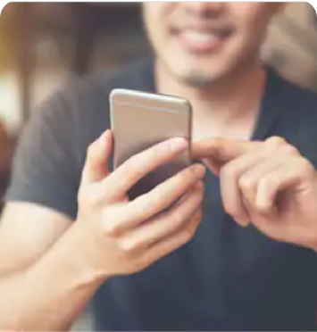 Smiling at Phone