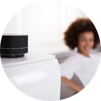 Woman looking at speaker